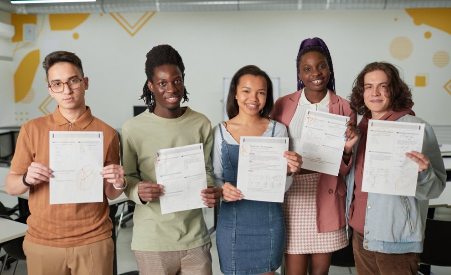 group of students showing their final exam results