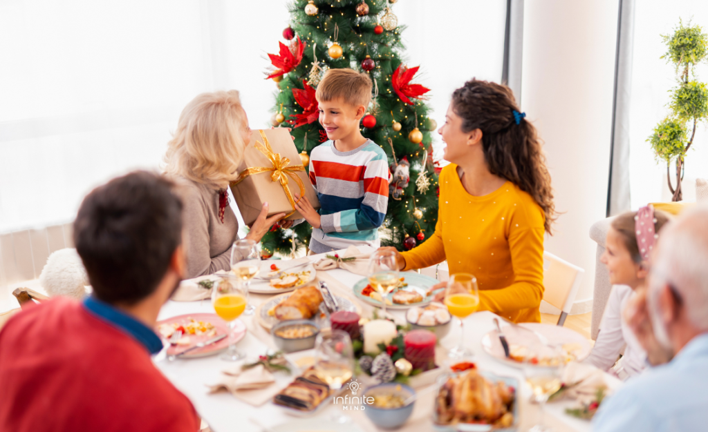 Brain health conscious family exchanging Christmas presents while having dinner