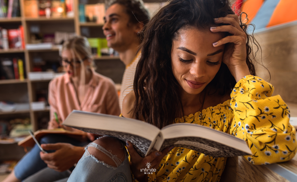 https://infinitemind.io/young-female-student-study-in-the-library-reading-book/