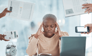 Woman overwhelmed, ADHD, stressed.