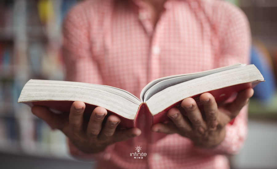 Mid section of a book in library