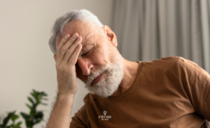 Senior Man Experiences Brain Fog Inside At Home