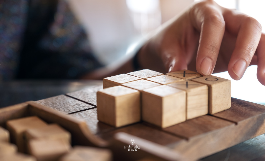 Person mentally rotating 3D shapes to train spatial reasoning.